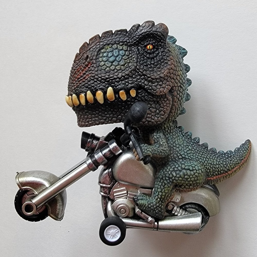 T-REX Riders by Schylling - pull backwards to rev it up for racing!